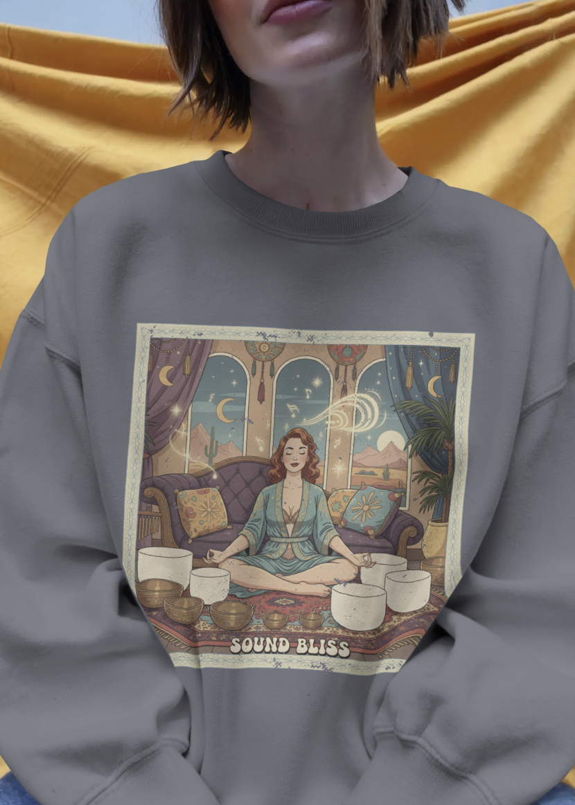Person wearing a sweatshirt with a 'Sound Bliss' design on a yellow background