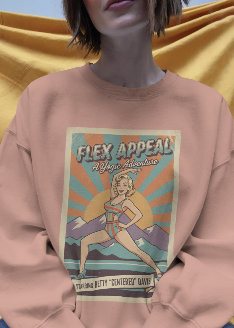 Person wearing a pink sweatshirt with a graphic design on a yellow background