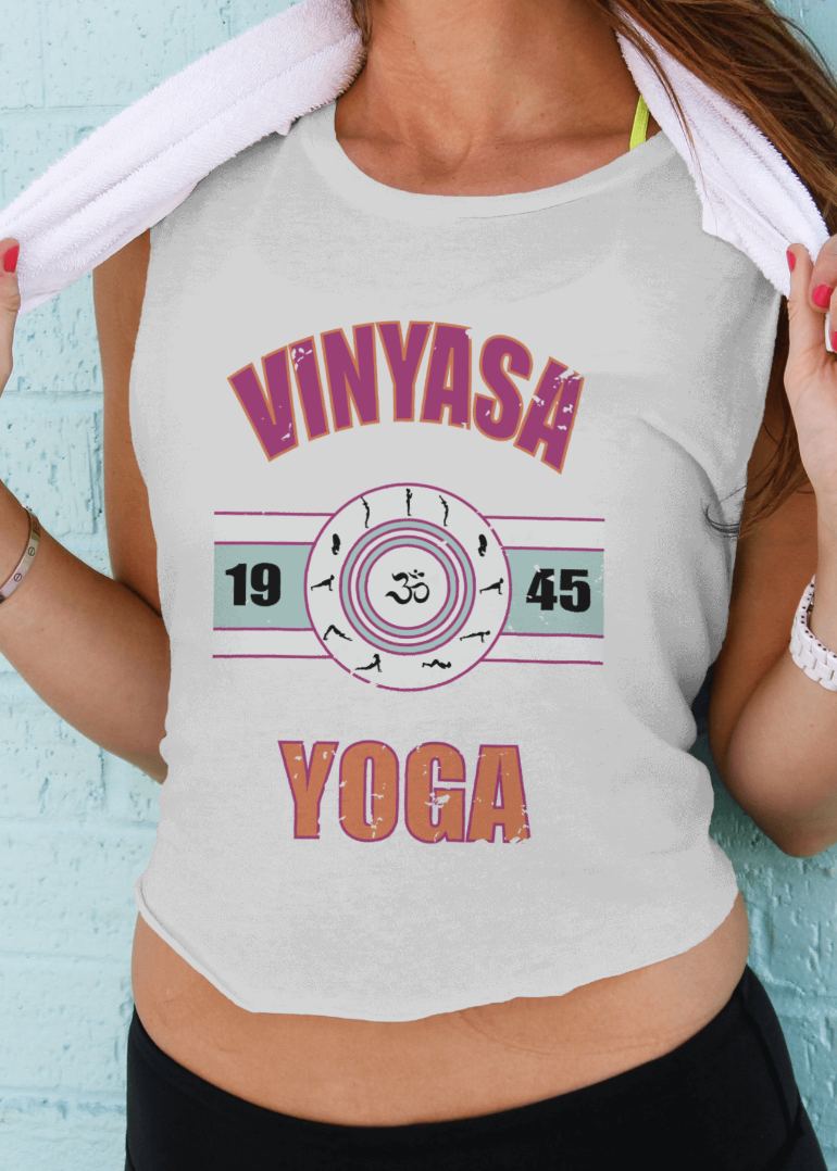 Person wearing a tank top with 'Vinyasa Yoga' design against a light blue background