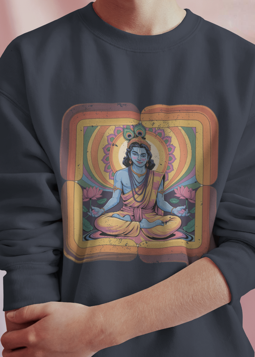 Person wearing a dark gray sweatshirt with a colorful graphic of a seated figure in a frame.