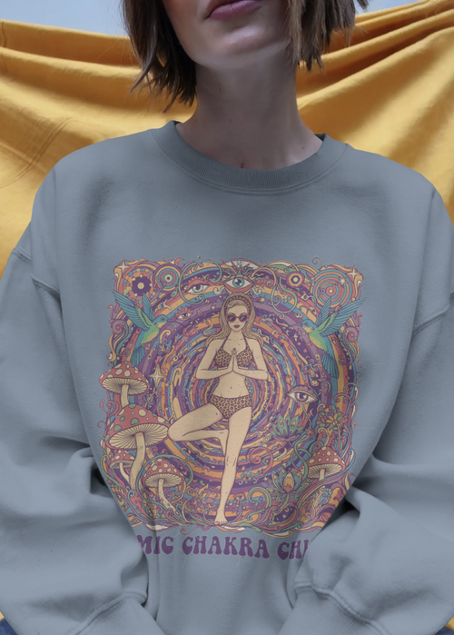 Gray sweatshirt with a colorful graphic design on a mustard yellow background