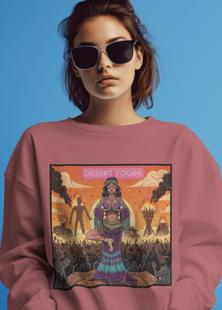 Person wearing a pink sweatshirt with a graphic design on a blue background