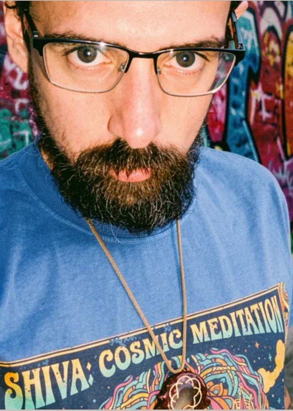 Kevin Whaley wearing Retro Flow Design Co.